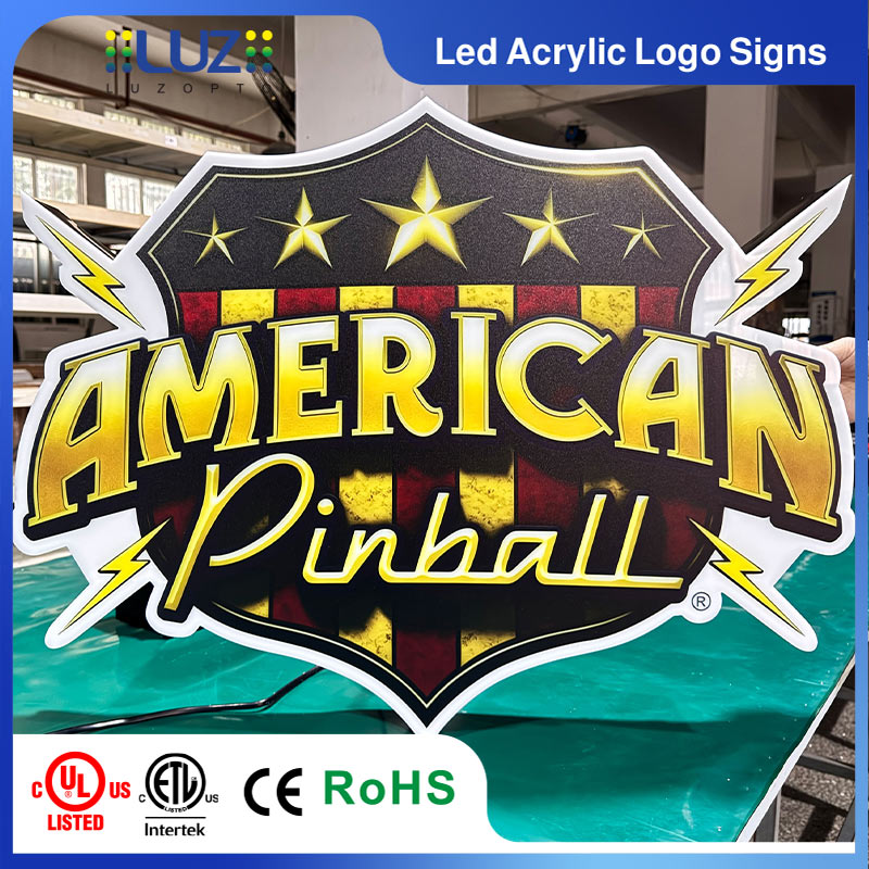 Angled view of 3D embossed thermoformed acrylic LED logo sign with raised letters.